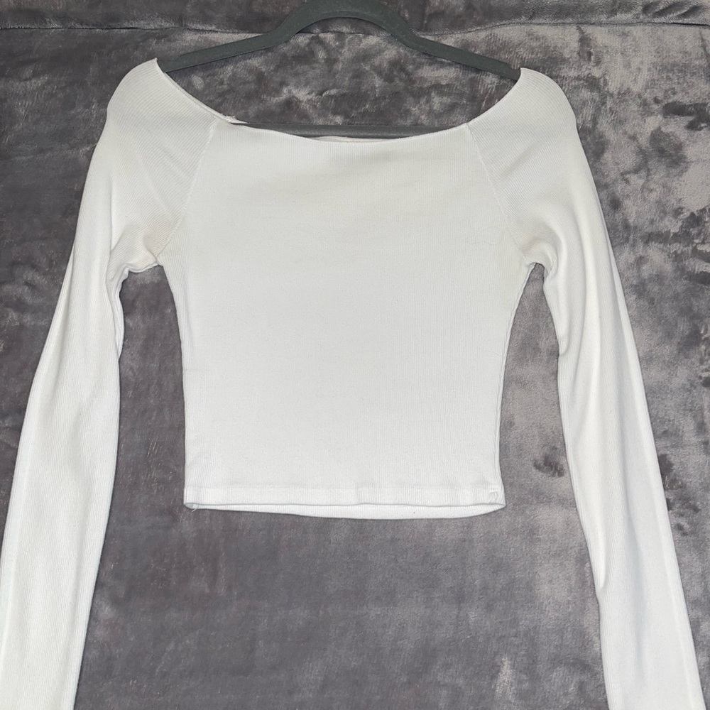 White cropped long sleeve with low shoulder neckline